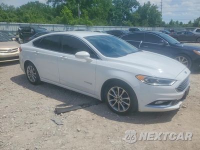 Czwarte zdjęcie samochodu z boku: 2017 FORD FUSION SE HYBRID VIN:3FA6P0LU4HR409740 - miniatura
