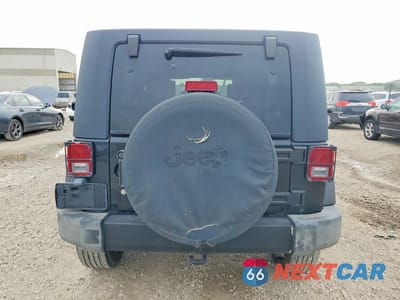 Zdjęcie 6 z 12 samochodu: 2008 JEEP WRANGLER UNLIMITED SAHARA VIN:1J8GA59148L542743 - miniatura