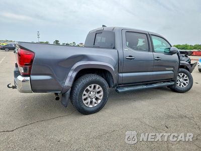 Trzecie zdjęcie samochodu z tyłu: 2019 TOYOTA TACOMA SR5 V6 VIN:3TMCZ5AN4KM210675 - miniatura