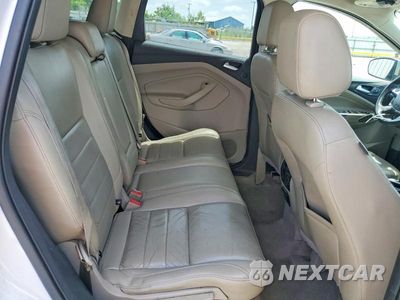 Zdjęcie 11 z 13 samochodu: 2016 FORD ESCAPE TITANIUM VIN:1FMCU9J94GUA92442 - miniatura
