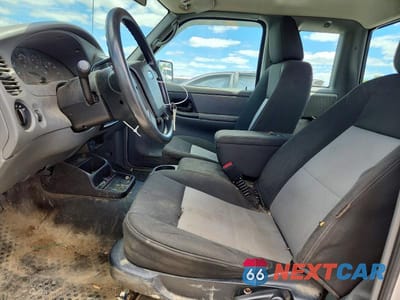 Zdjęcie 7 z 12 samochodu: 2011 FORD RANGER SUPER CAB VIN:1FTKR1ED8BPA71148 - miniatura