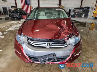 Piąte zdjęcie samochodu w środku: 2011 HONDA INSIGHT EX VIN:JHMZE2H7XBS009428 - miniatura