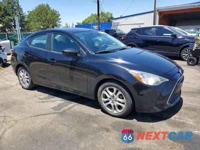 Czwarte zdjęcie samochodu z boku: 2016 SCION IA BASE VIN:3MYDLBZV5GY106531 - miniatura