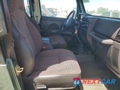 Zdjęcie 11 z 13 samochodu: 1999 JEEP WRANGLER / TJ SE VIN:1J4FY29PXXP436266 - miniatura