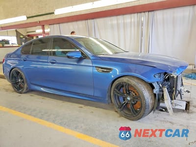Czwarte zdjęcie samochodu z boku: 2013 BMW M5 VIN:WBSFV9C56DD095999 - miniatura