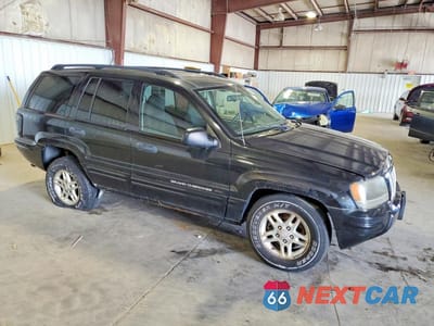 Czwarte zdjęcie samochodu z boku: 2004 JEEP GRAND CHEROKEE LAREDO VIN:1J4GW48S14C323126 - miniatura