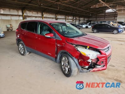 Czwarte zdjęcie samochodu z boku: 2013 FORD ESCAPE SEL VIN:1FMCU9H9XDUB40575 - miniatura