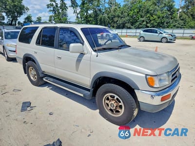 Czwarte zdjęcie samochodu z boku: 1997 TOYOTA 4RUNNER SR5 VIN:JT3GN86R8V0032436 - miniatura