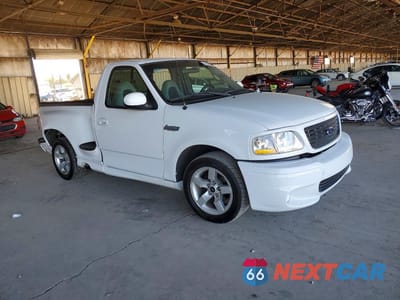 Czwarte zdjęcie samochodu z boku: 2001 FORD F150 SVT LIGHTNING VIN:2FTZF07381CB06079 - miniatura