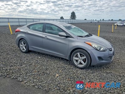 Czwarte zdjęcie samochodu z boku: 2012 HYUNDAI ELANTRA GLS VIN:KMHDH4AE6CU259757 - miniatura