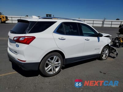Trzecie zdjęcie samochodu z tyłu: 2018 CHEVROLET EQUINOX PREMIER VIN:2GNAXNEX8J6282603 - miniatura