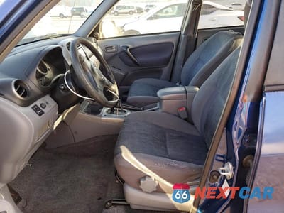 Zdjęcie 7 z 13 samochodu: 2002 TOYOTA RAV4 BASE VIN:JTEGH20V226001323 - miniatura