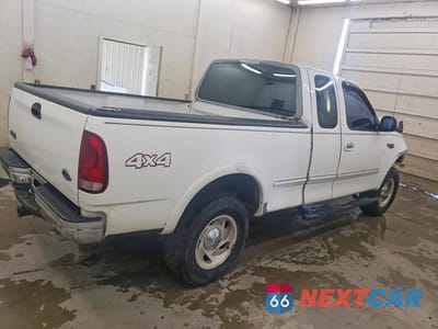 Trzecie zdjęcie samochodu z tyłu: 1997 FORD F150 VIN:1FTDX18W4VNC99272 - miniatura