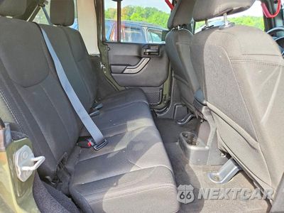 Zdjęcie 10 z 12 samochodu: 2015 JEEP WRANGLER UNLIMITED SPORT VIN:1C4BJWDGXFL740128 - miniatura