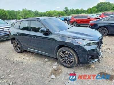 Czwarte zdjęcie samochodu z boku: 2024 BMW X1 M35I VIN:WBX13EF00R5Y55476 - miniatura