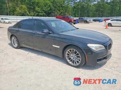 Czwarte zdjęcie samochodu z boku: 2014 BMW 740 LXI VIN:WBAYF4C56ED282030 - miniatura