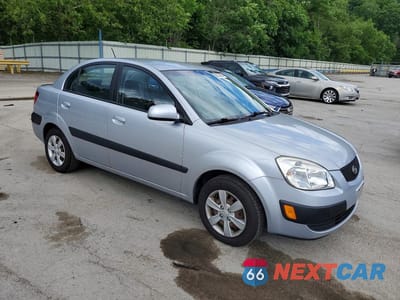 Czwarte zdjęcie samochodu z boku: 2009 KIA RIO BASE VIN:KNADE223796584619 - miniatura