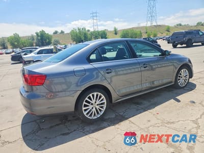 Trzecie zdjęcie samochodu z tyłu: 2014 VOLKSWAGEN JETTA SEL VIN:3VWL07AJ7EM422927 - miniatura