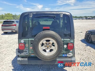 Zdjęcie 6 z 13 samochodu: 1999 JEEP WRANGLER / TJ SE VIN:1J4FY29PXXP436266 - miniatura