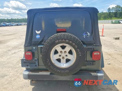 Zdjęcie 6 z 12 samochodu: 2004 JEEP WRANGLER / TJ SAHARA VIN:1J4FA59S64P768436 - miniatura