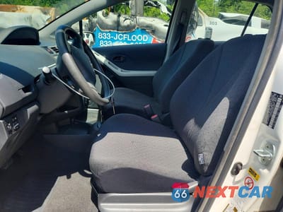 Zdjęcie 7 z 12 samochodu: 2009 TOYOTA YARIS BASE VIN:JTDKT903695232603 - miniatura