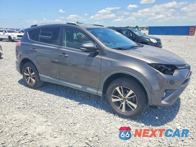 Czwarte zdjęcie samochodu z boku: 2016 TOYOTA RAV4 XLE VIN:2T3WFREV7GW252383 - miniatura