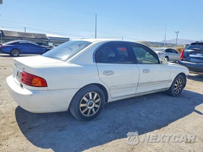 Trzecie zdjęcie samochodu z tyłu: 2001 KIA OPTIMA LX V6 VIN:KNAGD124X15048003 - miniatura