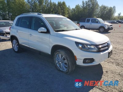 Czwarte zdjęcie samochodu z boku: 2016 VOLKSWAGEN TIGUAN S VIN:WVGBV7AX1GW514618 - miniatura