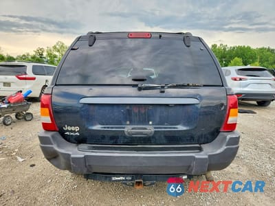 Zdjęcie 6 z 14 samochodu: 2003 JEEP GRAND CHEROKEE LAREDO VIN:1J4GW48S83C608856 - miniatura