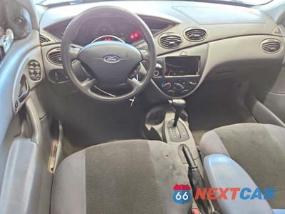 Zdjęcie 8 z 12 samochodu: 2004 FORD FOCUS SE COMFORT/SE SPORT VIN:1FAFP34314W169142 - miniatura