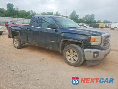 Czwarte zdjęcie samochodu z boku: 2015 GMC SIERRA C1500 SLE VIN:1GTR1UEC4FZ149613 - miniatura