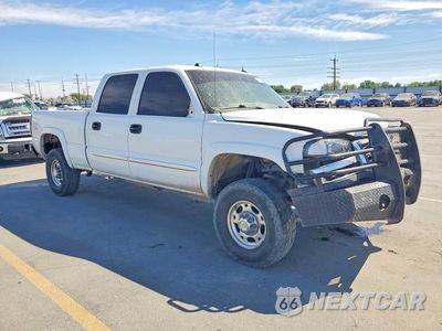 Czwarte zdjęcie samochodu z boku: 2004 GMC SIERRA K2500 HEAVY DUTY VIN:1GTHK23174F103867 - miniatura