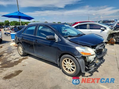 Czwarte zdjęcie samochodu z boku: 2008 TOYOTA YARIS BASE VIN:JTDBT903X81283690 - miniatura