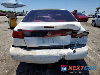 Zdjęcie 6 z 12 samochodu: 1998 NISSAN SENTRA BASE VIN:3N1AB41D8WL041479 - miniatura