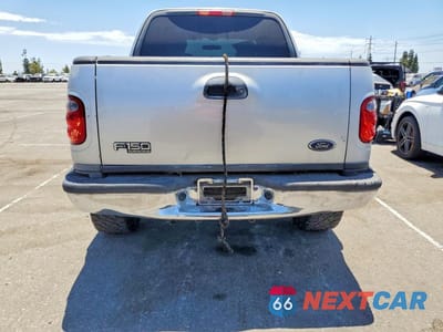 Zdjęcie 6 z 12 samochodu: 2003 FORD F150 SUPERCREW VIN:1FTRW07653KC18265 - miniatura