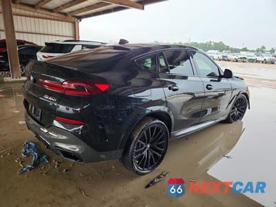 Trzecie zdjęcie samochodu z tyłu: 2022 BMW X6 M50I VIN:5UXCY8C03N9K75041 - miniatura
