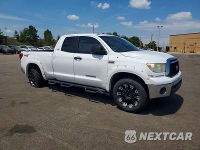 Czwarte zdjęcie samochodu z boku: 2012 TOYOTA TUNDRA DOUBLE CAB SR5 VIN:5TFRY5F16CX128218 - miniatura