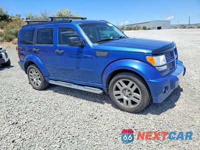 Czwarte zdjęcie samochodu z boku: 2009 DODGE NITRO R VIN:1D8GU58X69W549229 - miniatura
