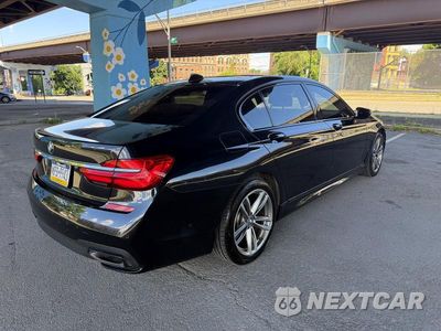 Czwarte zdjęcie samochodu z boku: 2019 BMW 750I XDRIVE VIN:WBA7F2C56K8240643 - miniatura