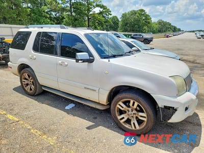 Czwarte zdjęcie samochodu z boku: 2010 MERCURY MOUNTAINEER PREMIER VIN:4M2EN3JE2AUJ04433 - miniatura