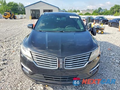 Piąte zdjęcie samochodu w środku: 2017 LINCOLN MKC PREMIERE VIN:5LMCJ1D97HUL50683 - miniatura