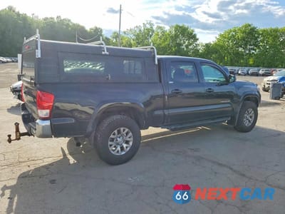 Trzecie zdjęcie samochodu z tyłu: 2017 TOYOTA TACOMA SR5 V6 VIN:5TFDZ5BN4HX028349 - miniatura