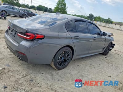 Trzecie zdjęcie samochodu z tyłu: 2022 BMW 530XE VIN:WBA33AG0XNCK81050 - miniatura