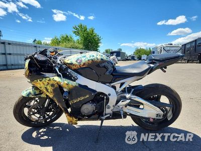 Trzecie zdjęcie samochodu z tyłu: 2011 HONDA CBR1000 RR VIN:JH2SC5947BK300488 - miniatura