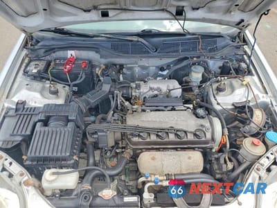 Zdjęcie 11 z 12 samochodu: 1999 HONDA CIVIC EX VIN:1HGEJ8248XL030536 - miniatura