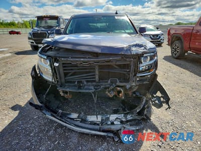 Piąte zdjęcie samochodu w środku: 2017 CHEVROLET TAHOE K1500 LT VIN:1GNSKBKCXHR242864 - miniatura