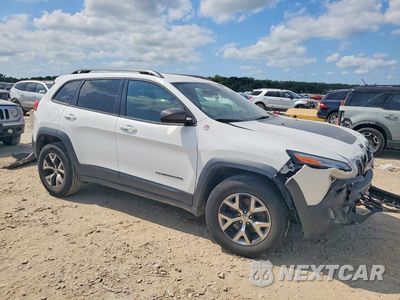 Czwarte zdjęcie samochodu z boku: 2016 JEEP CHEROKEE TRAILHAWK VIN:1C4PJMBS6GW109409 - miniatura