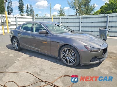 Czwarte zdjęcie samochodu z boku: 2014 MASERATI GHIBLI S VIN:ZAM57RTAXE1125207 - miniatura