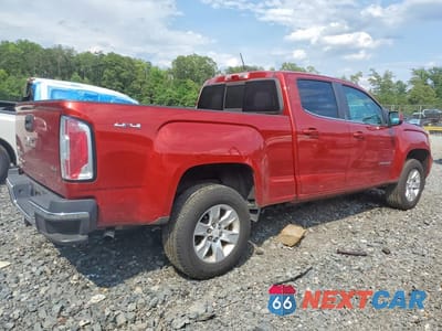 Trzecie zdjęcie samochodu z tyłu: 2016 GMC CANYON SLE VIN:1GTG6CE38G1268431 - miniatura