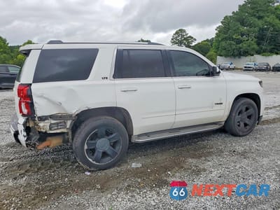 Trzecie zdjęcie samochodu z tyłu: 2015 CHEVROLET TAHOE C1500 LTZ VIN:1GNSCCKCXFR104970 - miniatura